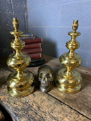 A pair of baluster form brass lamps