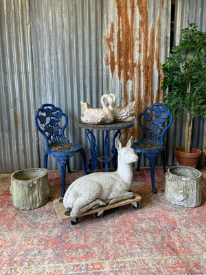 A large deer or fawn garden statue