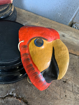 A Ukrainian papier-mâché mask of a macaw