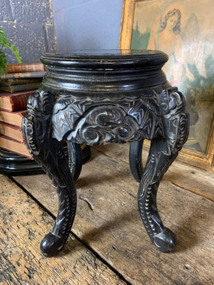 A small Chinese ebonised pedestal stand