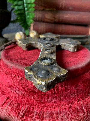 A set of oversized wooden rosary beads with memento mori motif