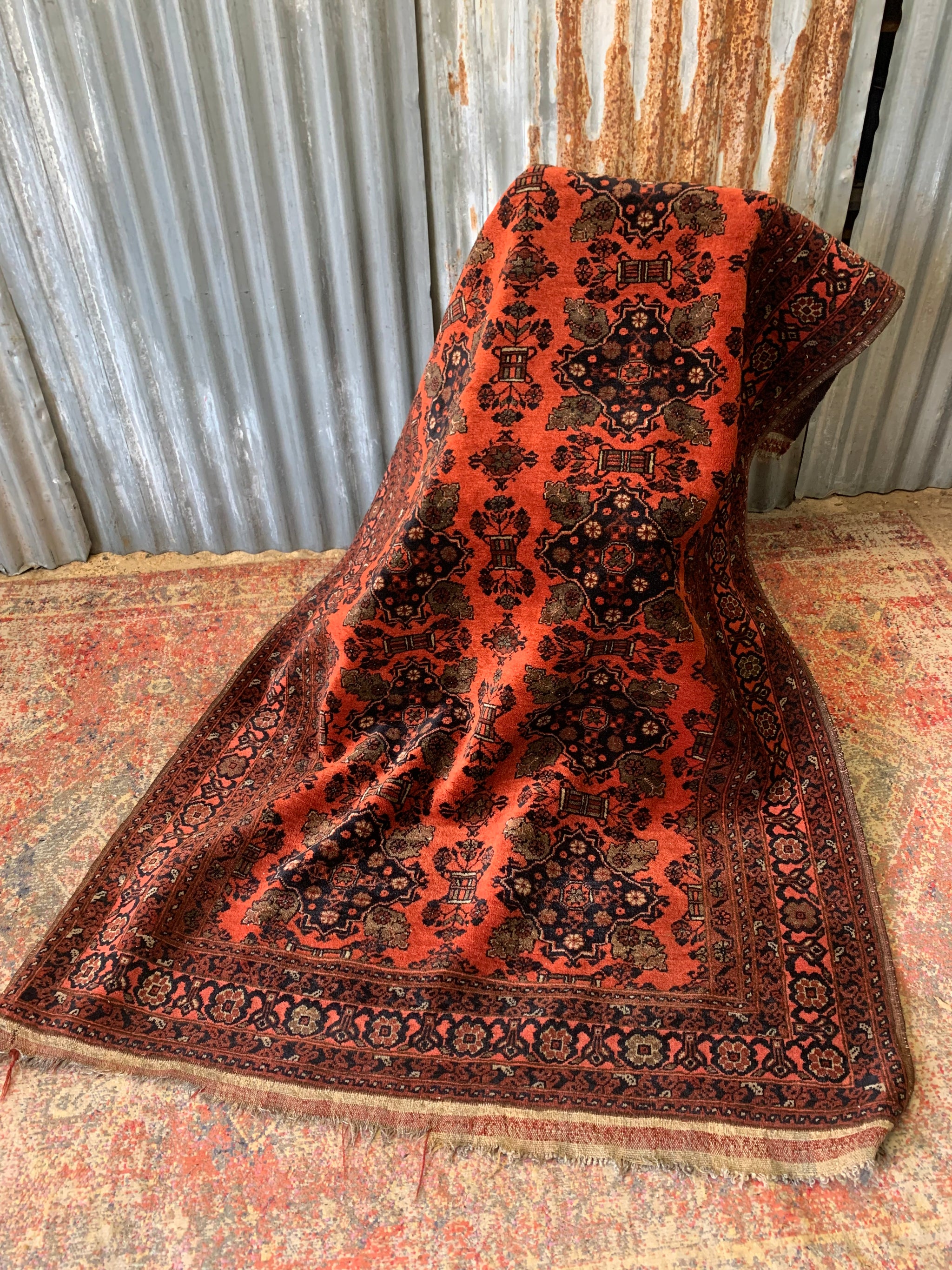 A orange ground Persian carpet rug ~ 205cm x 127cm
