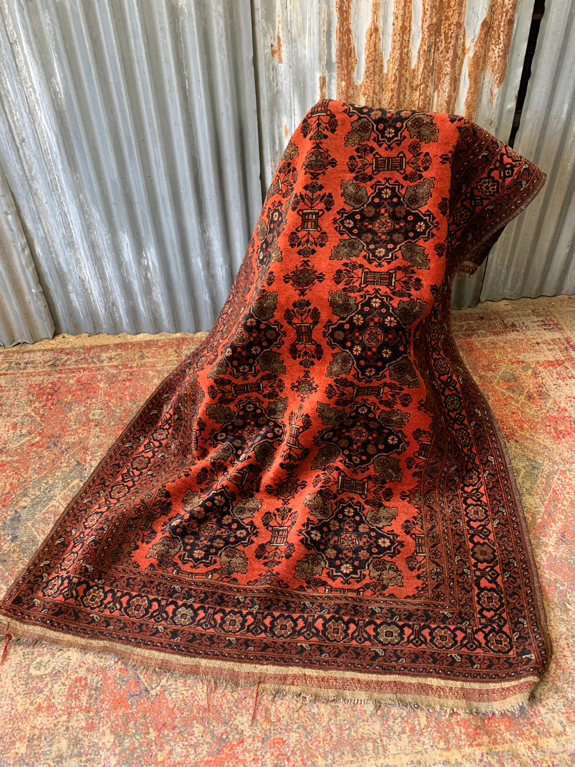 A orange ground Persian carpet rug ~ 205cm x 127cm