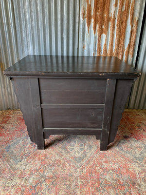 A carved wooden Chinese altar cabinet