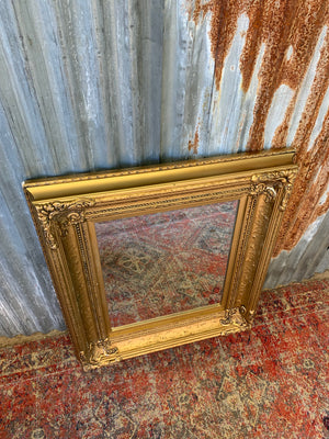 A large French style gilt mirror