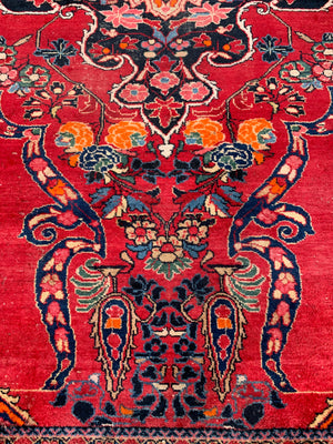 A very large rectangular red ground Persian floral rug ~ 12ft x 8ft