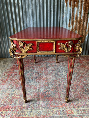 A red lacquer continental table