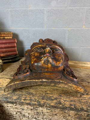 A very large hand-carved bodhisattva head
