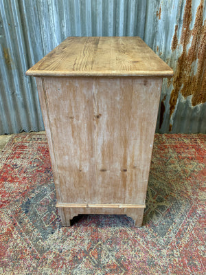 A pine chest of two over two drawers