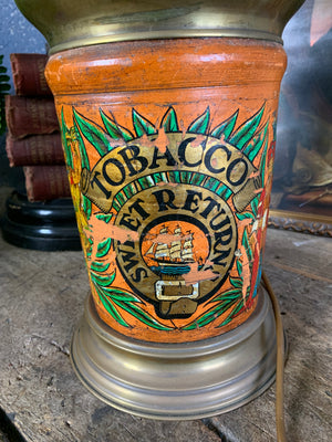 A converted tobacco jar lamp