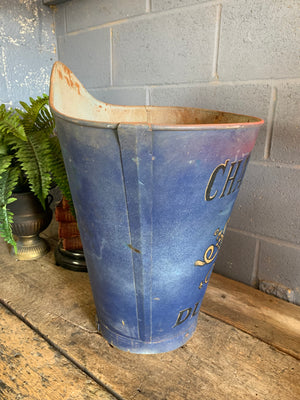 A large metal grape hod