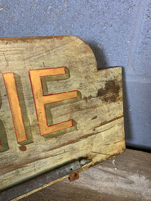 A French ‘charcuterie’ sign with hanging rack