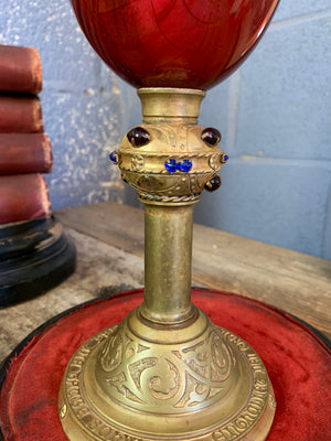 A gilded red glass chalice