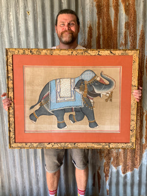 A large hand painted elephant on silk