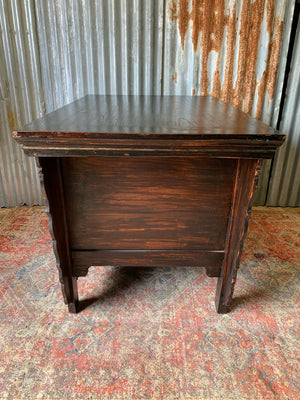 A carved wooden Chinese altar cabinet