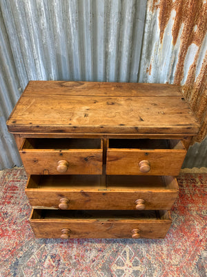 A pine chest of two over two drawers