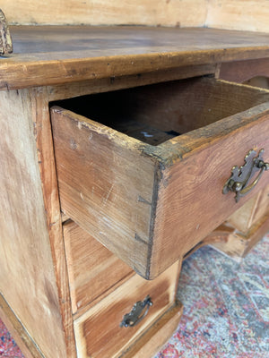 A pine clerk's desk with galleried top