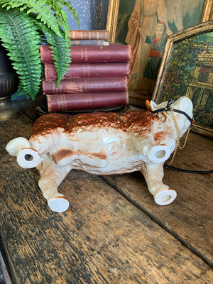 A large ceramic Hereford bull by Nelson Pottery