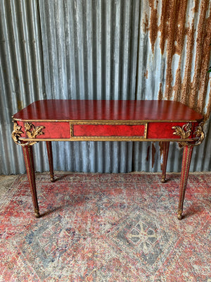 A red lacquer continental table