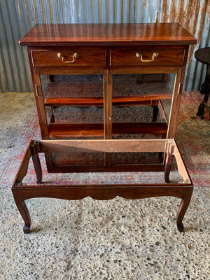 A mahogany double-fronted glass display cabinet with two drawers