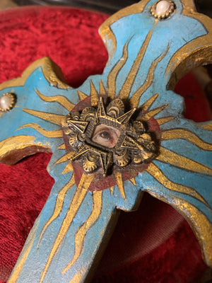 A set of oversized wooden rosary beads with eye motif