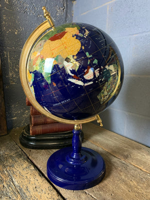 A lapis blue terrestrial gemstone globe