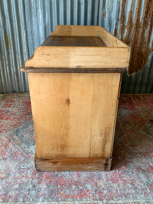 A pine clerk's desk with galleried top