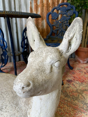 A large deer or fawn garden statue