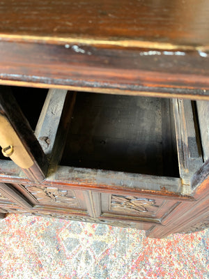 A carved wooden Chinese altar cabinet