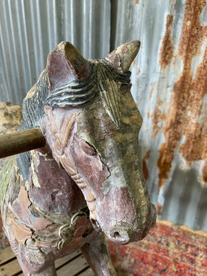 Carved wooden rocking horse