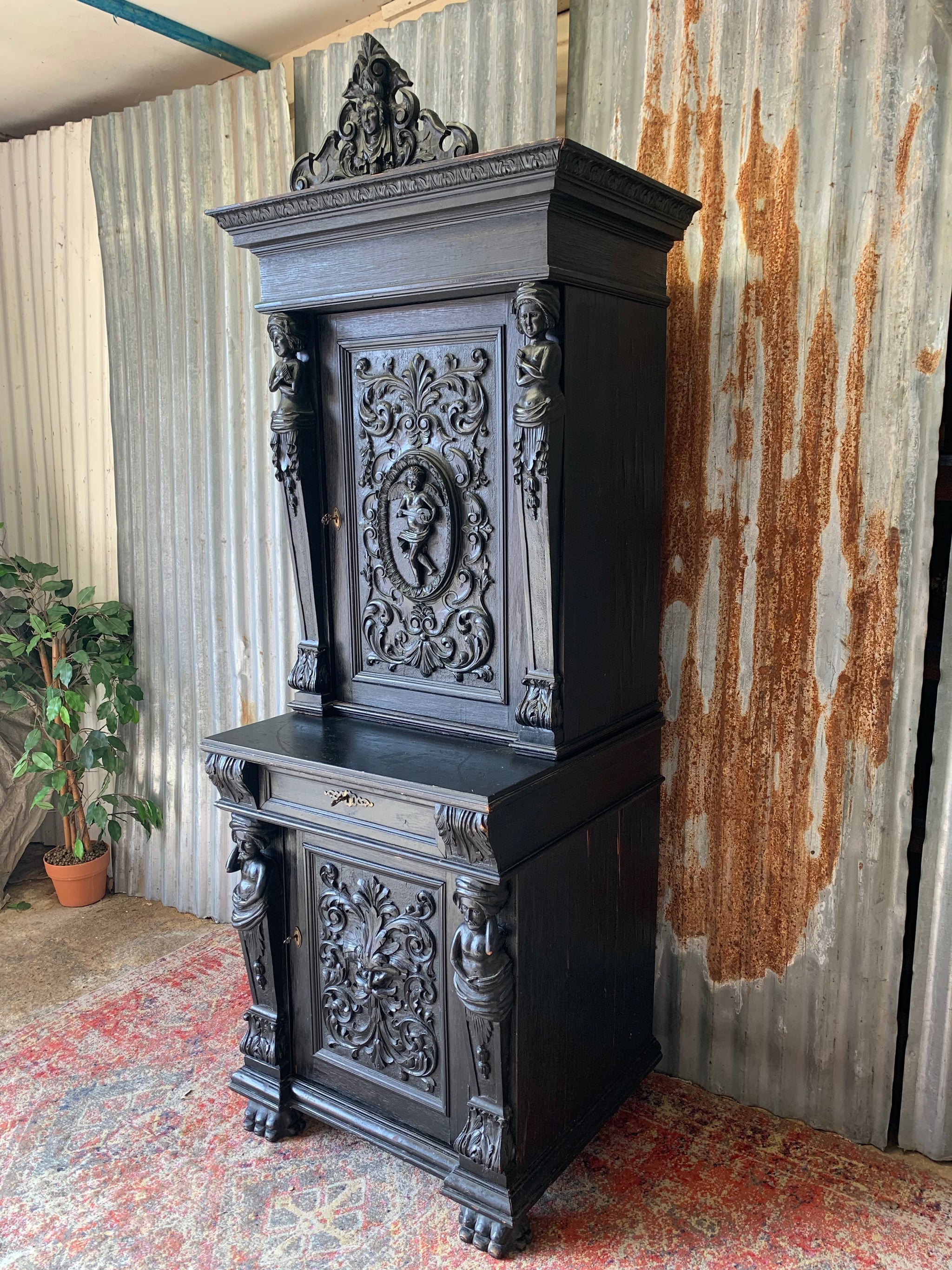 A heavily carved ebonised oak Gothic dresser - Belle and Beast Emporium A heavily carved ebonised oak Gothic dresser - Belle and Beast Emporium