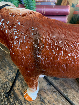 A large ceramic Hereford bull by Nelson Pottery