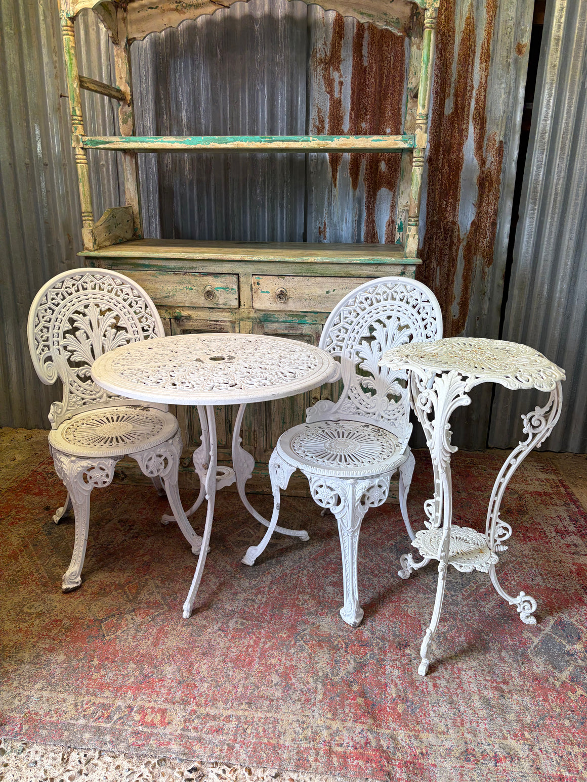 A white cast iron jardniere