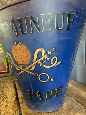 A large metal grape hod
