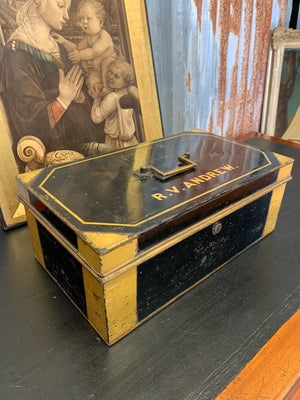 A Victorian black metal strong box with lock and key