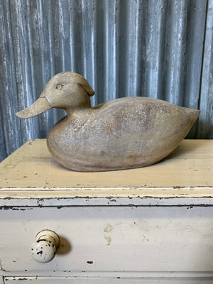A wooden duck decoy