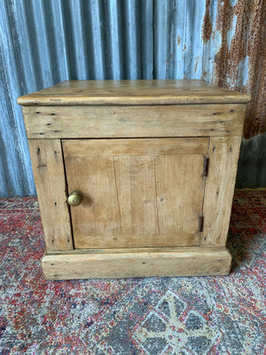 A Victorian square pine cupboard