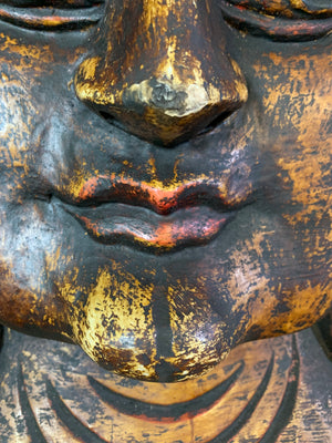 A very large hand-carved bodhisattva head