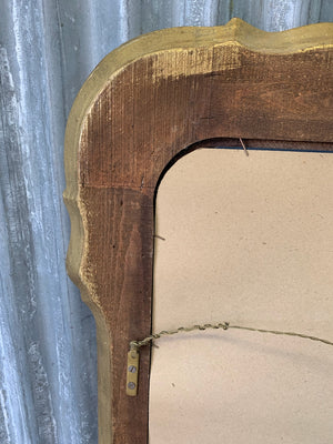 A large giltwood wall mirror