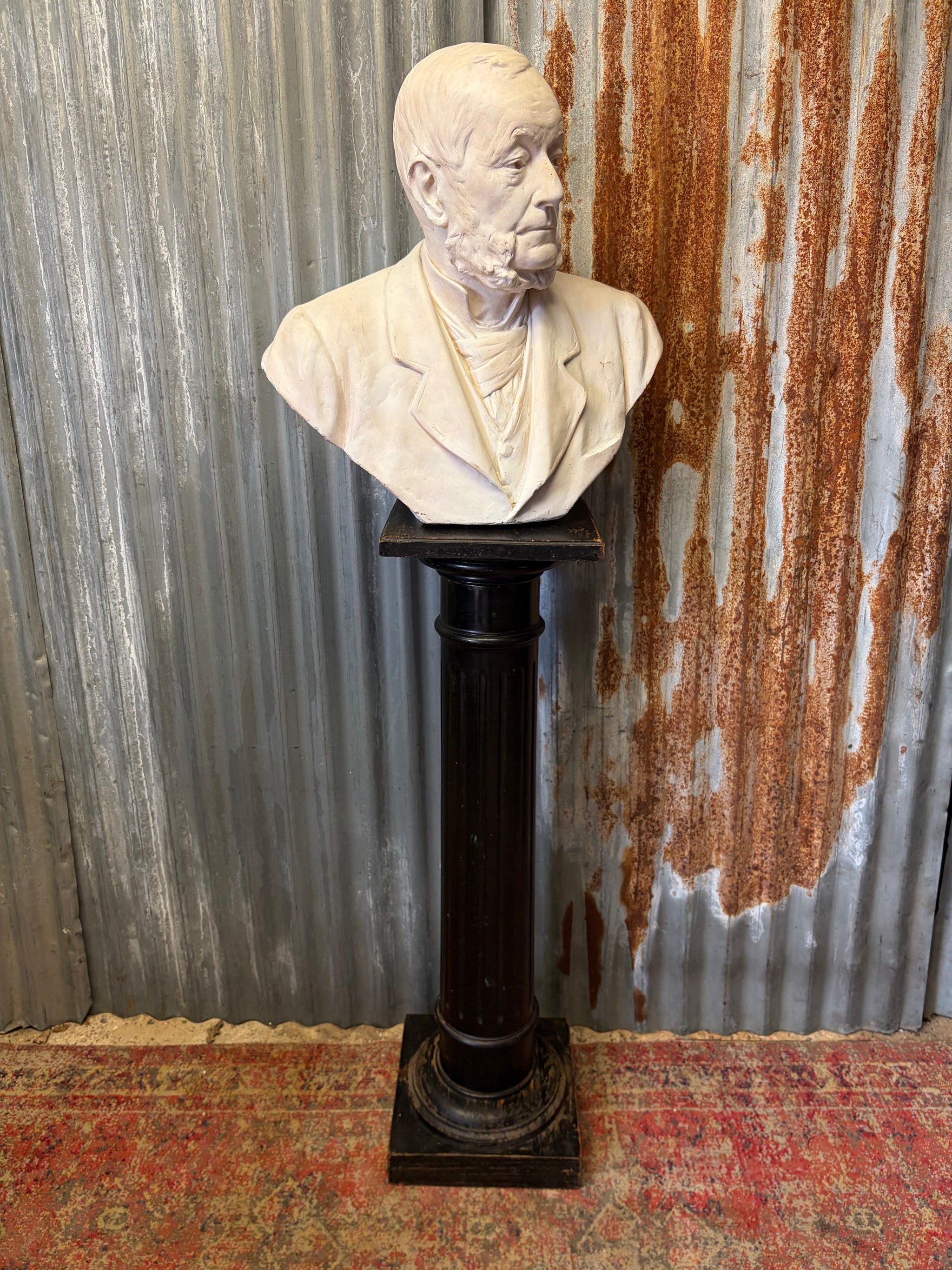 A plaster bust of a gentleman by sculptor Herbert Hampton