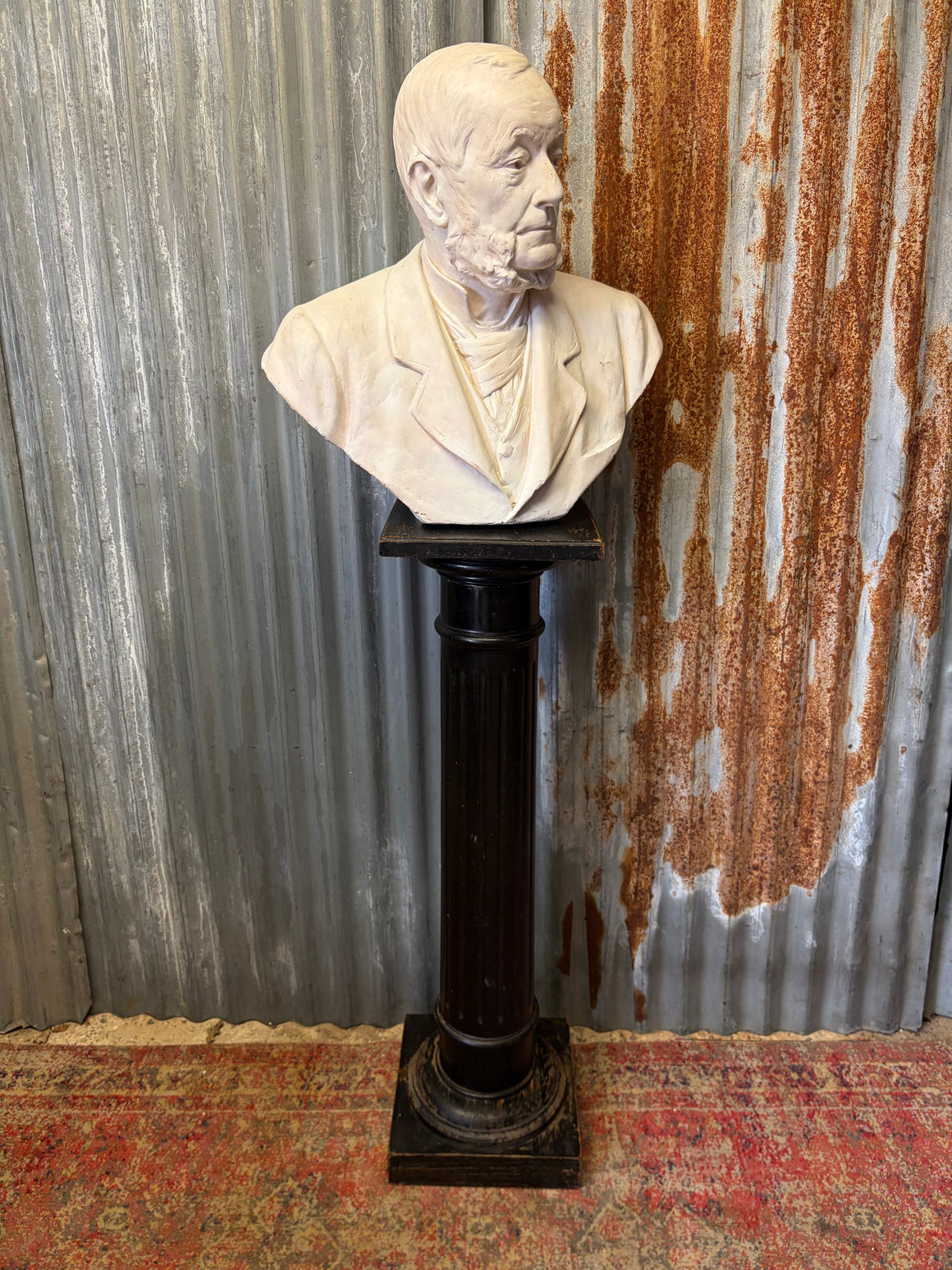 A plaster bust of a gentleman by sculptor Herbert Hampton