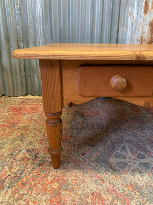 A large pine coffee table