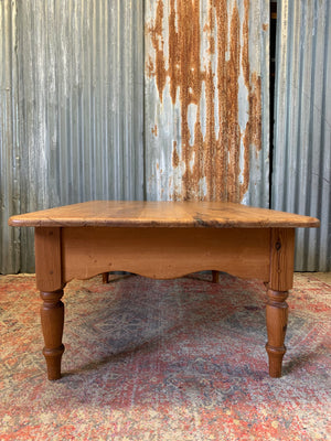 A large pine coffee table