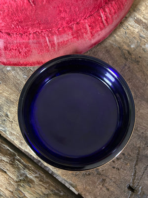 A blue glass myrrh apothecary jar by the Royal Pharmaceutical Society