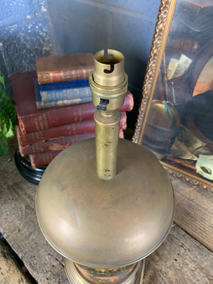 A converted tobacco jar lamp