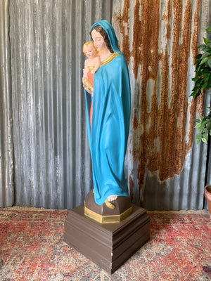 A very large plaster Madonna and Child statue