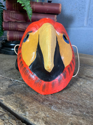 A Ukrainian papier-mâché mask of a macaw