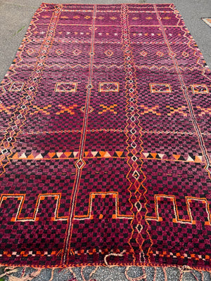 A very large purple ground Berber rug ~ 415cm or 14ft