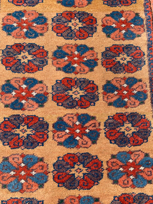 A long yellow ground red blue Persian runner rug ~ 257cm x 67cm