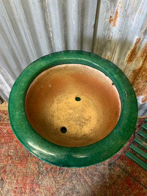 A large Chinese green glaze clay jardiniere